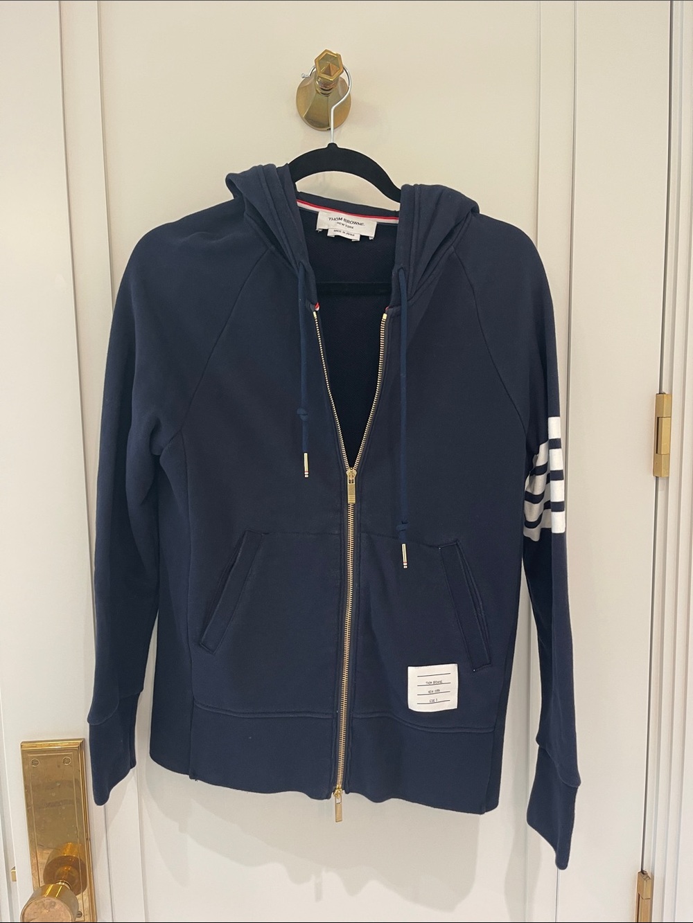 Thom Browne Navy Hooded Zip Jacket with White Four-Stripe Sleeve